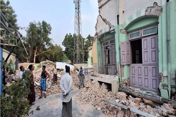 Muslim clerics and residents are seen inside the quake-hit Shwe Phone Shein mosque in Mandalay, Myanmar, in late April 2025.
