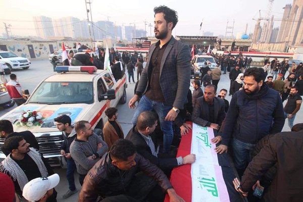 گزارش لحظه به لحظه از مراسم وداع با شهدای مقاومت در عراق گزارش لحظه به لحظه از مراسم وداع با شهدای مقاومت در عراق