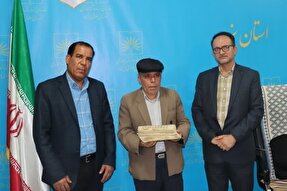 اهدای قرآن خطی دست‌نویس 100 ساله به سازمان اسناد یزد