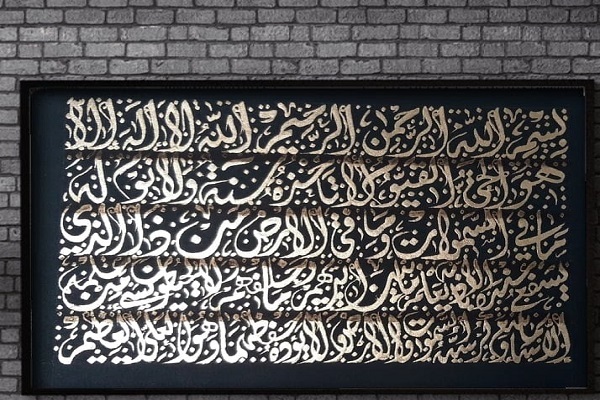 بانوی خوشنویس تونسی و انس با قرآن + عکس بانوی خوشنویس تونسی و انس با قرآن + عکس