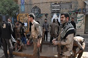 عکس | آیین گِل‌مالی عاشورای حسینی در کوهدشت