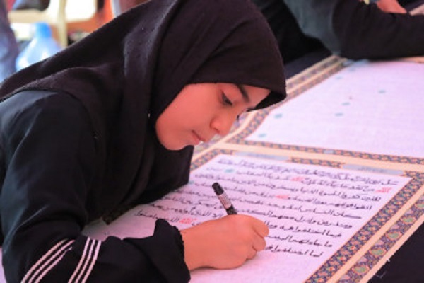 نگارش طولانی‌ترین قرآن توسط عتبه حسینی + عکس