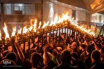 عکس | آیین مشعل‌گردانی شب تاسوعا‎ در مشهد
