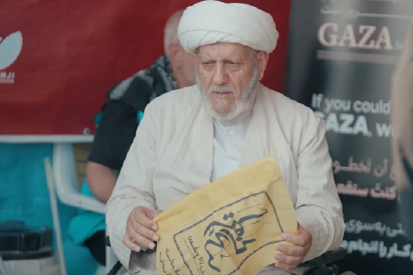 روحانی جانباز ؛ سفیر آیه‌ها در مسیر پیاده‌روی اربعین + فیلم