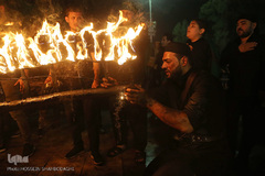 ⁨آیین مشعل گردانی نجفی‌های مقیم قم⁩