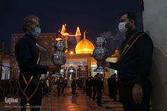 آیین تعویض پرچم و اقامه عزا در حرم حضرت معصومه(س)