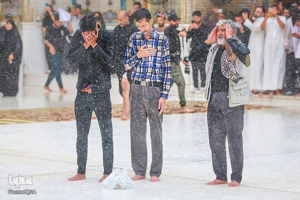 برکت باران در ماه مبارک رمضان در حرم حضرت علی(ع)