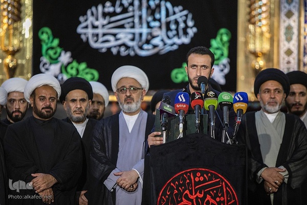 مراسم تعویض پرچم گنبد حرم حضرت اباالفضل العباس(ع) از قرمز به مشکی