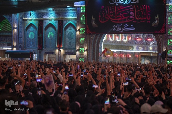 مراسم تعویض پرچم گنبد حرم حضرت اباالفضل العباس(ع) از قرمز به مشکی