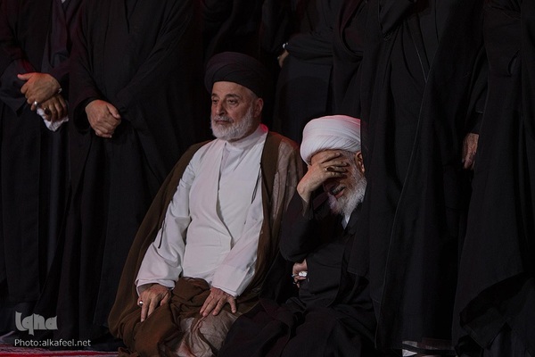 مراسم تعویض پرچم گنبد حرم حضرت اباالفضل العباس(ع) از قرمز به مشکی