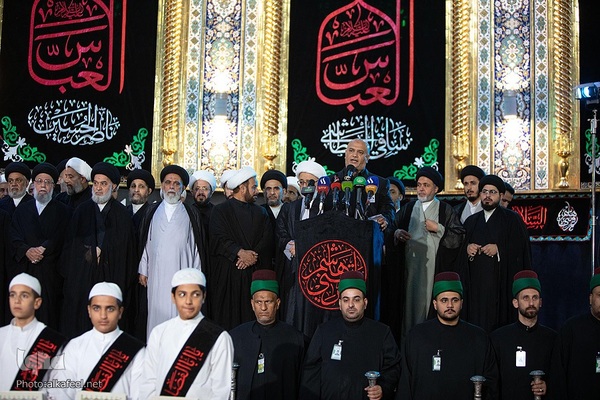 مراسم تعویض پرچم گنبد حرم حضرت اباالفضل العباس(ع) از قرمز به مشکی