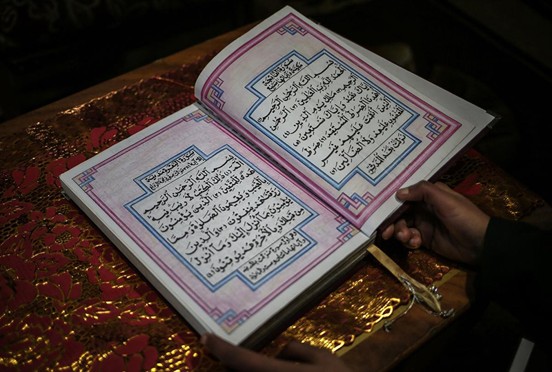 Le Coran manuscrit par une jeune palestinienne+photos