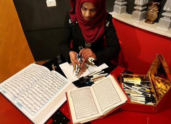 Le Coran manuscrit par une jeune palestinienne+photos